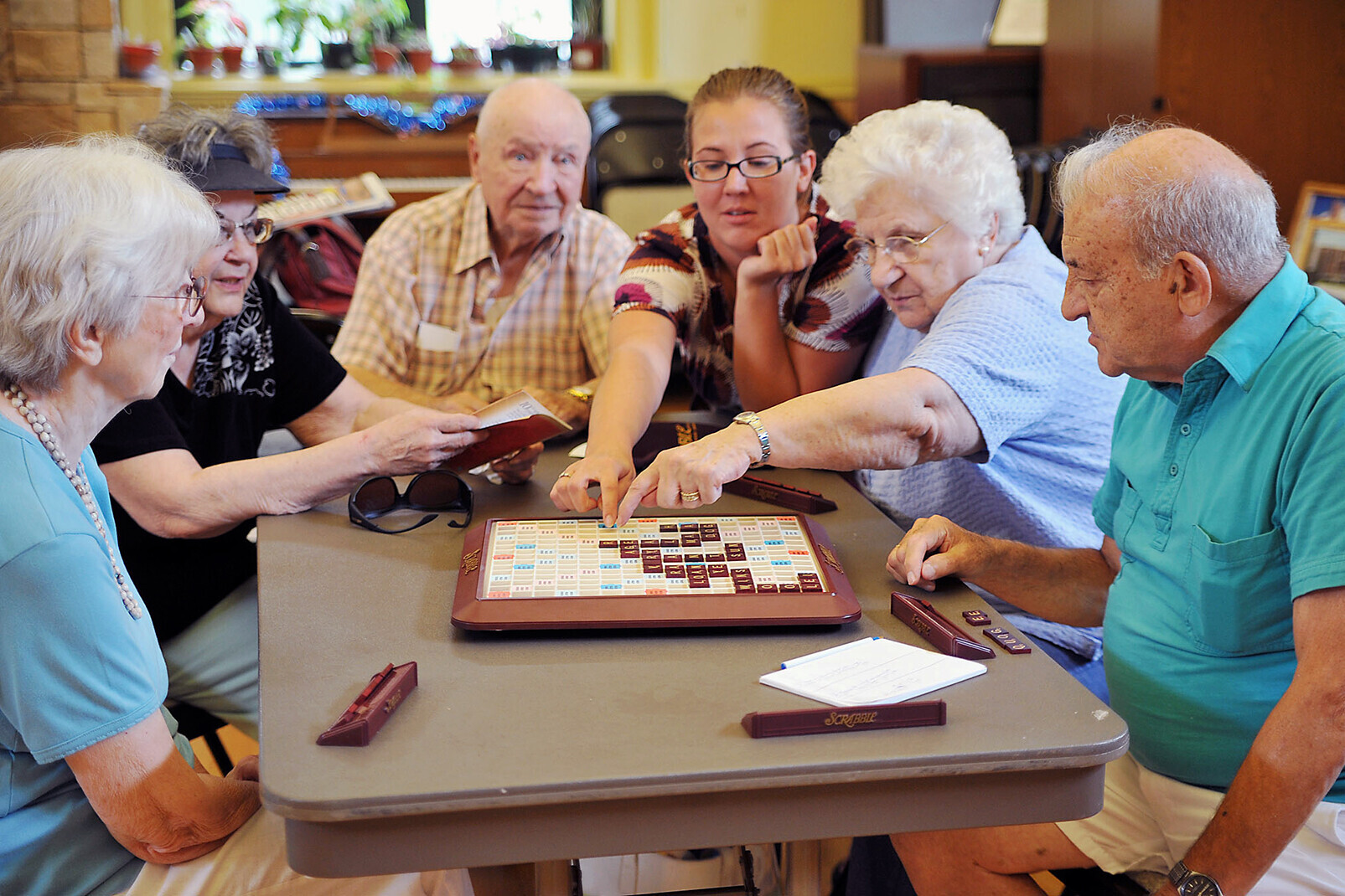 Seniors playing group game in Vilas Home